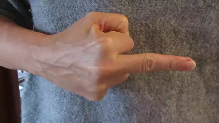 side middle finger gesture