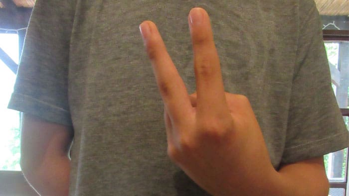 Outward facing V sign