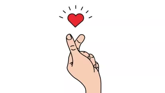 finger heart hand sign