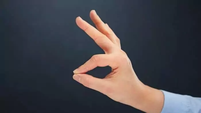 teen smoking weed hand sign