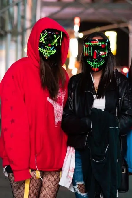 people wear led lit masks from the movie the purge election news photo 1625246150