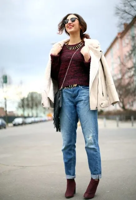 The marsala sweatshirt looks great with cuffed boyfriend jeans, suede ankle boots in the same shade, a fringe chain handbag, and a stylish jacket.