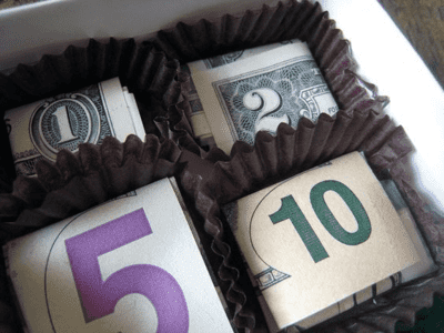 chocolates in a box with money